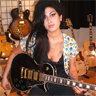 Amy holding a guitar avatar